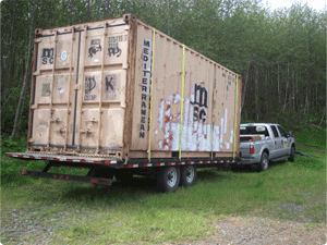 Truck towing Container